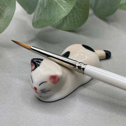 Cat brush rest