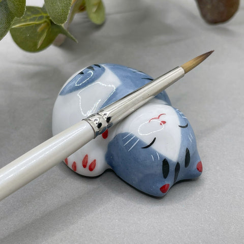 Resting Cat brush rest