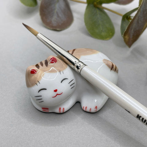Resting Cat brush rest