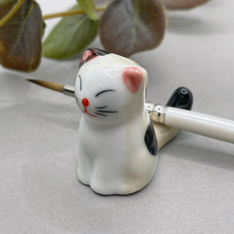 Cat brush rest