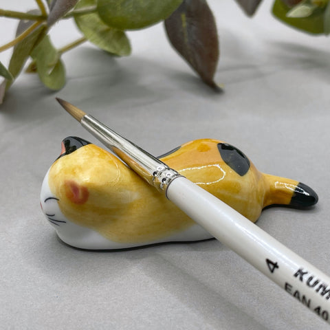 Cat brush rest
