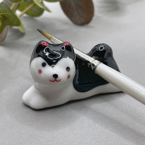 Dog brush rest