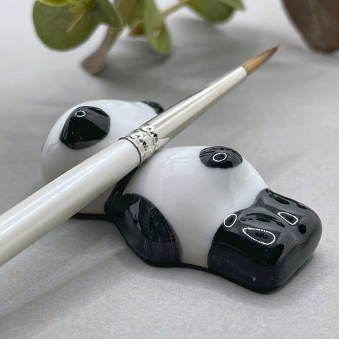 Panda brush rest