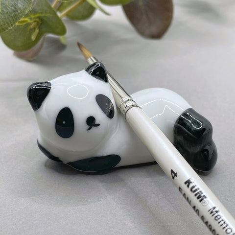 Panda brush rest